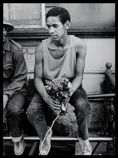 Hiram Maristany, Young Man With Roses, 1971. Courtesy of the Smithsonian American Arts Museum Archive.