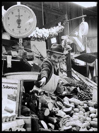 Hiram Maristany, Man Standing at La Marqueta Stall, 1966. Courtesy of the Smithsonian American Arts Museum Archive.