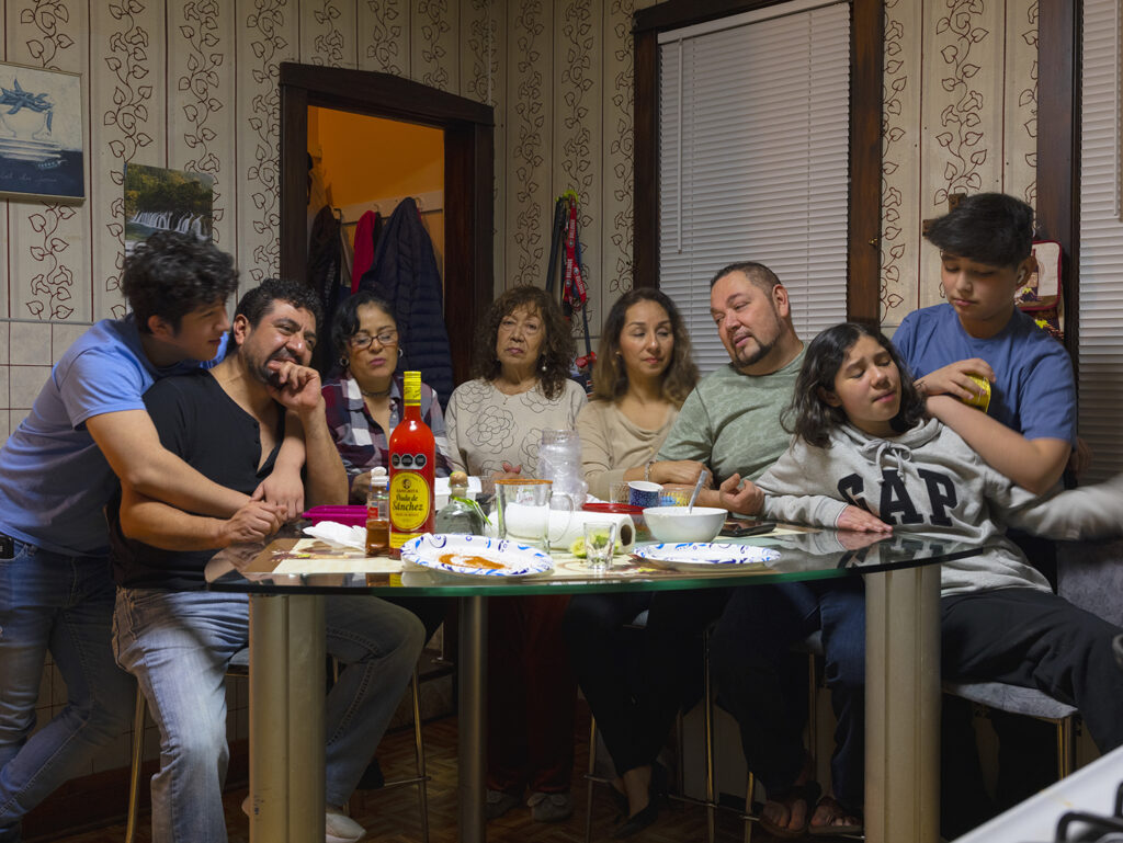 Jennifer Teresa Villanueva, Reunidos para Año Nuevo durante COVID / Gathered for New Years during COVID, from the series ¿Quieres Salvar Al Mundo? Empieza por tu Familia / Do You Want To Save The World? Start with Your Family, 2021, Archival inkjet print, 24”x36”.